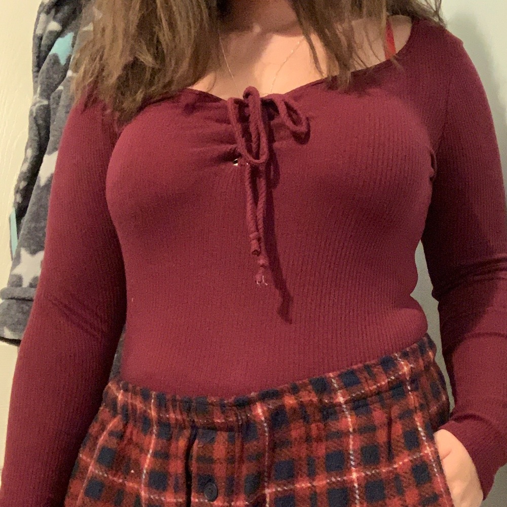 maroon body suit
